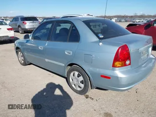 2003 Hyundai Accent GL with VIN KMHCG45C73U455357, listed as a IAAI auction lot 41395159 with 86,488 mi miles. Bid and sale history available at carsss.com. Image 3.