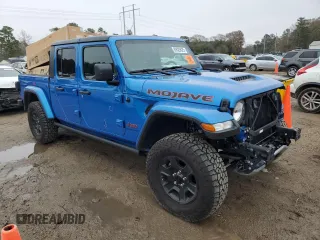 2023 Jeep Gladiator Mojave с VIN 1C6JJTEG7PL580727, выставлен на аукционе Copart как лот 89020825 с пробегом 12 707 миль миль и Списание • Salvage title. История ставок и продаж доступна на DreamBid. Изображение 4.