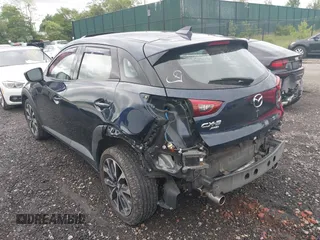 2019 Mazda CX-3 Touring z VIN JM1DKFC76K0446440, wystawiony jako IAAI lot #42314401 z przebiegiem 57 901 mil mil oraz . Historia ofert i sprzedaży dostępna na DreamBid. Obrazek 3.