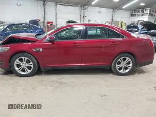 2015 Ford Taurus SEL z VIN 1FAHP2H88FG163179, wystawiony jako IAAI lot #42345579 z przebiegiem 142 424 mil mil oraz . Historia ofert i sprzedaży dostępna na DreamBid. Obrazek 14.