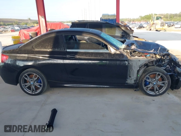 2016 BMW 2 Series M235i with VIN WBA1J7C55GV360926, listed as a IAAI auction lot 41482584 with 60,172 mi miles. Bid and sale history available at carsss.com. Image 13.