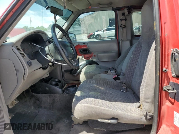 1999 Ford Ranger XL z VIN 1FTZR15V3XPC09094, wystawiony jako Copart lot #56475015 z przebiegiem 167 065 mil mil oraz Szkoda całkowita • Salvage title. Historia ofert i sprzedaży dostępna na DreamBid. Obrazek 7.