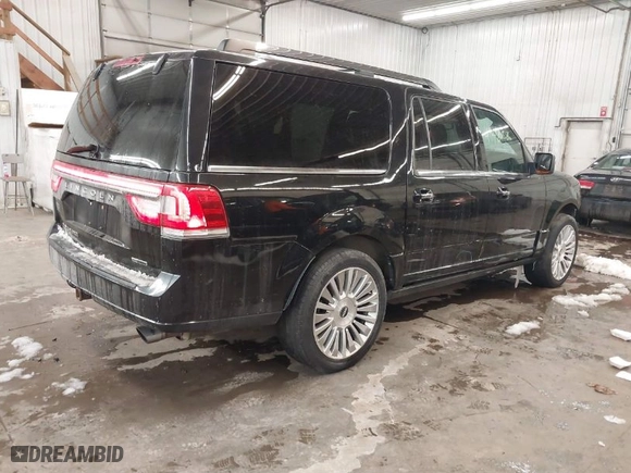 2015 Lincoln Navigator L with VIN 5LMJJ3JT9FEJ05006, listed as a IAAI auction lot 41480586 with 159,280 mi miles. Bid and sale history available at carsss.com. Image 4.