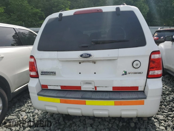 2011 Ford Escape Hybrid with VIN 1FMCU5K34BKA94201, listed as a Copart auction lot 73773474 with 116,089 mi miles and Clean title. Bid and sale history available at DreamBid. Image 6.