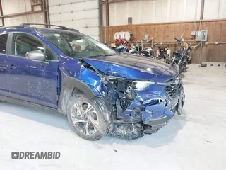 2024 Subaru Crosstrek Premium z VIN JF2GUADC3R8318644, wystawiony jako IAAI lot #42558586 z przebiegiem 33 648 mil mil oraz . Historia ofert i sprzedaży dostępna na DreamBid. Obrazek 6.