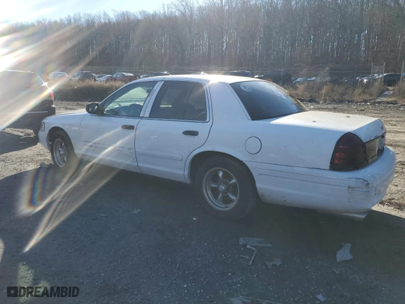 2001 Ford Crown Victoria Police Pkg Police Interceptor with VIN 2FAFP71WX1X151387, listed as a Copart auction lot 86810244 with 165,566 mi miles and Salvage Title. Bid and sale history available at carsss.com. Image 2.