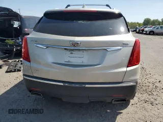 2017 Cadillac XT5 Premium Luxury AWD z VIN 1GYKNERS2HZ127538, wystawiony jako Copart lot #54570095 z przebiegiem 108 037 mil mil oraz Szkody całkowita. Historia ofert i sprzedaży dostępna na DreamBid. Obrazek 6.