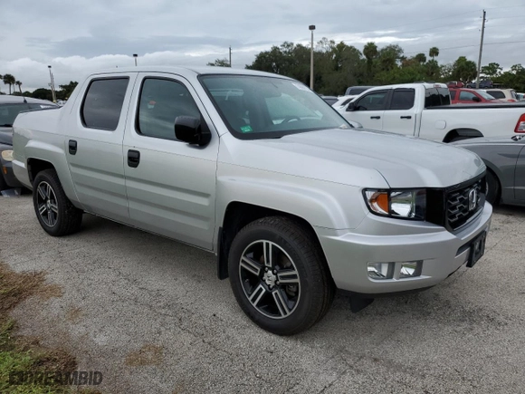 2014 Honda Ridgeline Sport with VIN 5FPYK1F76EB005713, listed as a Copart auction lot 74694724 with 73,039 mi miles and Salvage Title. Bid and sale history available at carsss.com. Image 4.