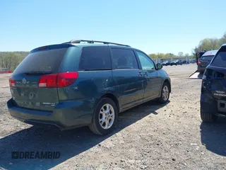 2005 Toyota Sienna XLE with VIN 5TDBA22C75S051329, listed as a IAAI auction lot 42147864 with 187,831 mi miles. Bid and sale history available at carsss.com. Image 4.