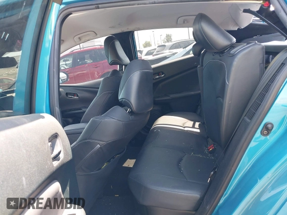 2021 Toyota Prius LE with VIN JTDKAMFP7M3169633, listed as a IAAI auction lot 41986170 with 55,925 mi miles and . Bid and sale history available at DreamBid. Image 8.