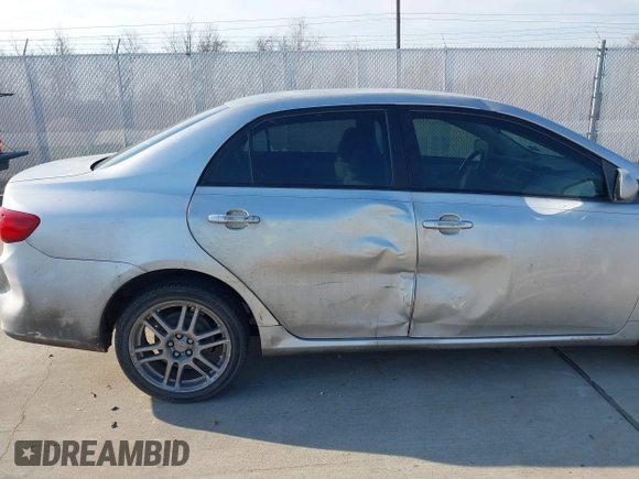 2011 Toyota Corolla L with VIN JTDBU4EE0BJ102517, listed as a IAAI auction lot 41702532 with 296,646 mi miles. Bid and sale history available at carsss.com. Image 6.