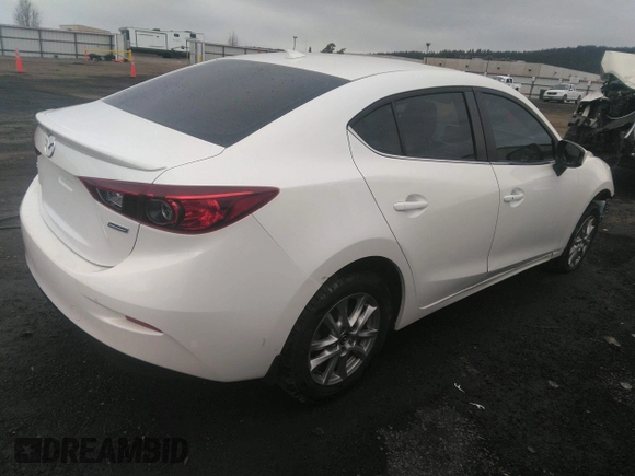 2015 Mazda 3 i Grand Touring z VIN JM1BM1W75F1232796, wystawiony jako IAAI lot #39976305 z przebiegiem 69 161 mil mil oraz . Historia ofert i sprzedaży dostępna na DreamBid. Obrazek 4.