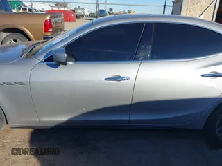 2015 Maserati Ghibli z VIN ZAM57XSA7F1135961, wystawiony jako IAAI lot #40831583 z przebiegiem 89 671 mil mil oraz . Historia ofert i sprzedaży dostępna na DreamBid. Obrazek 14.