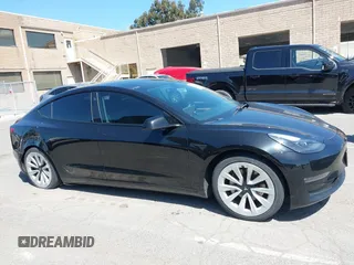 2021 Tesla Model 3 Long Range with VIN 5YJ3E1EB4MF064631, listed as a IAAI auction lot 41424856 with 95,511 mi miles and . Bid and sale history available at DreamBid. Image 13.