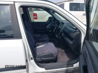 2004 Honda CR-V LX with VIN JHLRD68454C004803, listed as a IAAI auction lot 41910388 with 192,766 mi miles and . Bid and sale history available at carsss.com. Image 5.