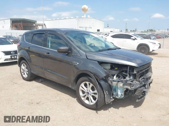 2017 Ford Escape SE z VIN 1FMCU0GD1HUE71410, wystawiony jako IAAI lot #42026516 z przebiegiem 173 804 mil mil oraz . Historia ofert i sprzedaży dostępna na DreamBid. Obrazek 1.