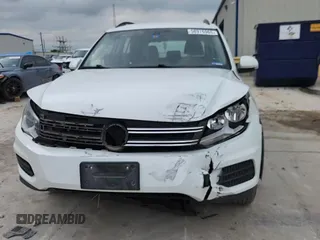 2017 Volkswagen Tiguan S с VIN WVGAV7AX6HK034093, выставлен на аукционе Copart как лот 58976965 с пробегом 103 474 миль миль и Списание • Salvage title. История ставок и продаж доступна на DreamBid. Изображение 14.