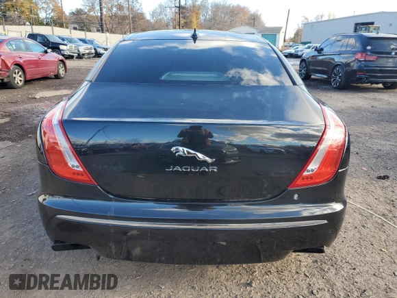 2015 Jaguar XJ Portfolio with VIN SAJWJ2GD2F8V76289, listed as a Copart auction lot 48222815 with 95,420 mi miles and Salvage title. Bid and sale history available at DreamBid. Image 6.