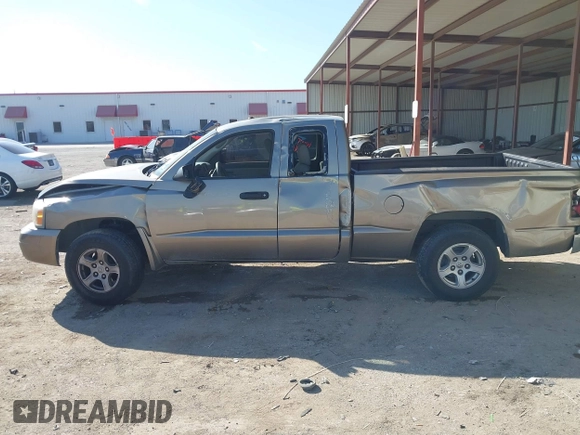 2006 Dodge Dakota SLT with VIN 1D7HE42K16S666071, listed as a IAAI auction lot 41676231 with 129,977 mi miles and . Bid and sale history available at carsss.com. Image 14.