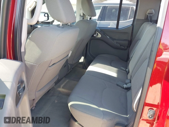2016 Nissan Frontier S with VIN 1N6AD0ER9GN745596, listed as a IAAI auction lot 40860927 with 136,457 mi miles and . Bid and sale history available at DreamBid. Image 8.