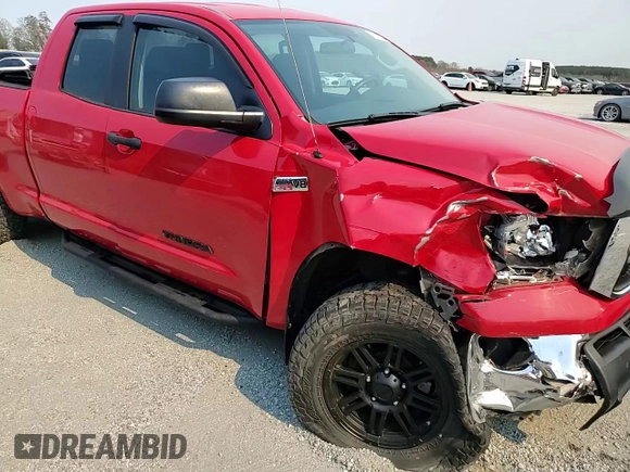 2011 Toyota Tundra 4WD Truck with VIN 5TFUW5F18BX177662, listed as a Copart auction lot 50690675 with 124,369 mi miles and Salvage Title. Bid and sale history available at carsss.com. Image 12.