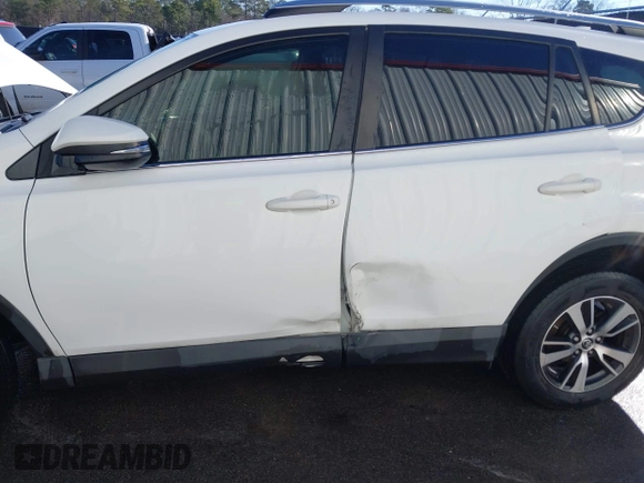2018 Toyota RAV4 XLE with VIN JTMWFREV7JJ743297, listed as a IAAI auction lot 41579019 with 102,442 mi miles. Bid and sale history available at carsss.com. Image 6.