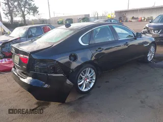 2018 Jaguar XF with VIN SAJBE4EV4JCY56439, listed as a IAAI auction lot 41390873 with 59,599 mi miles and . Bid and sale history available at DreamBid. Image 4.