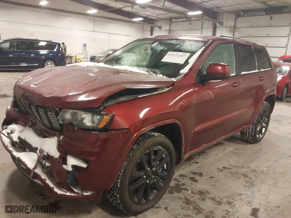 2018 Jeep Grand Cherokee Laredo E with VIN 1C4RJFAG9JC436803, listed as a IAAI auction lot 41572437 with 106,941 mi miles. Bid and sale history available at carsss.com. Image 17.