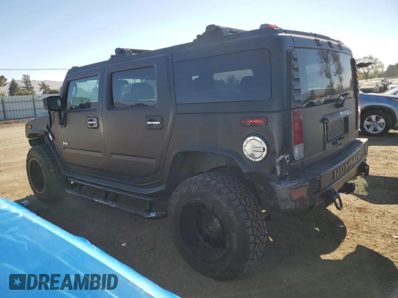 2006 Hummer H2 with VIN 5GRGN23U96H101430, listed as a Copart auction lot 75453514 with 168,958 mi miles and Salvage Title. Bid and sale history available at carsss.com. Image 2.
