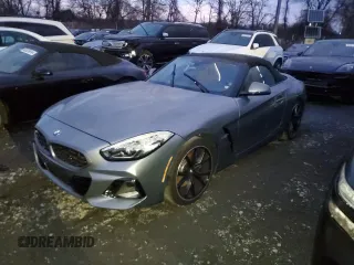 2024 BMW Z4 sDriveM40i with VIN WBAHF9C02RWY35106, listed as a Copart auction lot 82878254 with 3,199 mi miles and Salvage Title. Bid and sale history available at carsss.com. Image 1.
