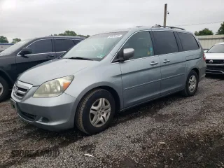 2005 Honda Odyssey EX-L with VIN 5FNRL38785B096535, listed as a Copart auction lot 60976455 with 113,556 mi miles and Salvage title. Bid and sale history available at DreamBid. Image 1.