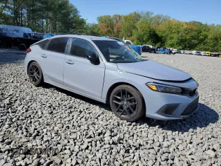 2023 Honda Civic Sport z VIN 19XFL2H85PE004313, wystawiony jako Copart lot #54268555 z przebiegiem Nie podano mil oraz Szkoda całkowita • Salvage title. Historia ofert i sprzedaży dostępna na DreamBid. Obrazek 4.