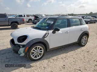 2015 MINI Countryman S z VIN WMWZC3C59FWT03482, wystawiony jako Copart lot #56914825 z przebiegiem 63 851 mil mil oraz Szkody całkowita. Historia ofert i sprzedaży dostępna na DreamBid. Obrazek 1.