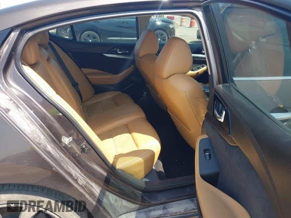 2016 Nissan Maxima SR z VIN 1N4AA6AP0GC400686, wystawiony jako IAAI lot #42378284 z przebiegiem 139 996 mil mil oraz . Historia ofert i sprzedaży dostępna na DreamBid. Obrazek 8.