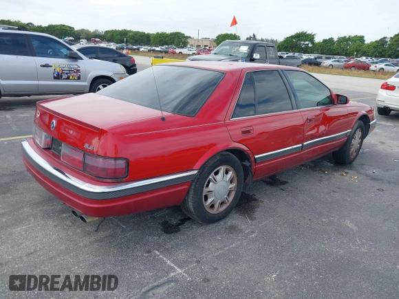 1995 Cadillac Seville Luxury SLS with VIN 1G6KS52Y7SU833943, listed as a IAAI auction lot 40873559 with 1 mi miles. Bid and sale history available at carsss.com. Image 4.
