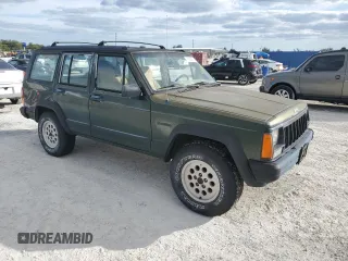 1996 Jeep Cherokee SE z VIN 1J4FJ28S9TL211073, wystawiony jako Copart lot #78052574 z przebiegiem 174 967 mil mil oraz Nie do naprawy • Non repairable. Historia ofert i sprzedaży dostępna na DreamBid. Obrazek 4.