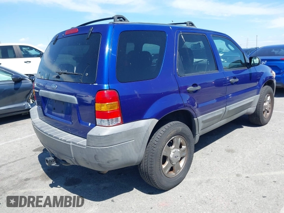 2005 Ford Escape XLS Value with VIN 1FMYU02Z85KD90338, listed as a IAAI auction lot 41916569 with 174,870 mi miles. Bid and sale history available at carsss.com. Image 4.