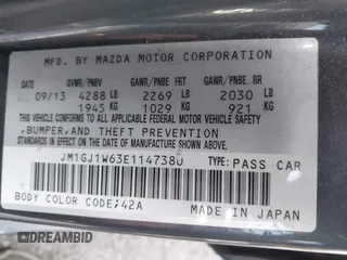 2014 Mazda 6 i Grand Touring with VIN JM1GJ1W63E1147380, listed as a IAAI auction lot 41928637 with 140,091 mi miles and . Bid and sale history available at DreamBid. Image 9.