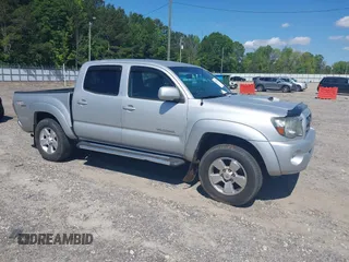 2010 Toyota Tacoma PreRunner z VIN 3TMJU4GN3AM093600, wystawiony jako IAAI lot #42204198 z przebiegiem 339 898 mil mil oraz . Historia ofert i sprzedaży dostępna na DreamBid. Obrazek 1.
