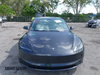 2025 Tesla Model 3 Long Range with VIN 5YJ3E1EA7SF940208, listed as a IAAI auction lot 42433793 with 1,983 mi miles and . Bid and sale history available at DreamBid. Image 13.