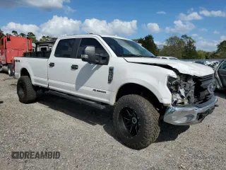 2017 Ford Super Duty F-250 SRW Lariat with VIN 1FT7W2BT2HEE85689, listed as a Copart auction lot 51426635 with 210,236 mi miles and Salvage Title. Bid and sale history available at carsss.com. Image 4.