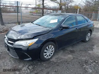 2015 Toyota Camry Hybrid LE with VIN 4T1BD1FK3FU164092, listed as a IAAI auction lot 41886726 with 396,189 mi miles. Bid and sale history available at carsss.com. Image 17.