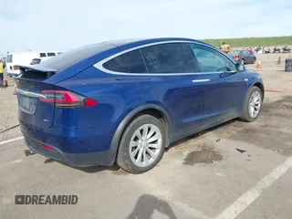 2016 Tesla Model X 70D z VIN 5YJXCAE29GF015890, wystawiony jako IAAI lot #41637564 z przebiegiem 145 848 mil mil oraz . Historia ofert i sprzedaży dostępna na DreamBid. Obrazek 4.