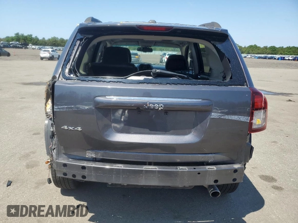 2016 Jeep Compass High Altitude with VIN 1C4NJDEB0GD709177, listed as a Copart auction lot 61248065 with 45,558 mi miles and Salvage title. Bid and sale history available at DreamBid. Image 6.