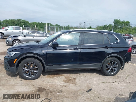 2023 Volkswagen Tiguan SE with VIN 3VVMB7AXXPM003447, listed as a IAAI auction lot 42566061 with 39,185 mi miles and . Bid and sale history available at DreamBid. Image 14.