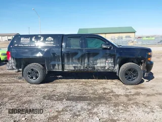 2015 Chevrolet Silverado 1500 LT with VIN 1GCVKREC3FZ332669, listed as a IAAI auction lot 41680418 with 106,095 mi miles and . Bid and sale history available at DreamBid. Image 14.