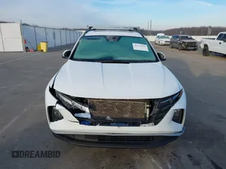 2022 Hyundai Tucson SEL with VIN 5NMJCCAE7NH158933, listed as a IAAI auction lot 41531628 with 57,996 mi miles and . Bid and sale history available at DreamBid. Image 12.