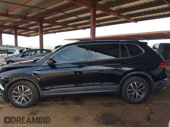 2018 Volkswagen Tiguan SEL z VIN 3VV3B7AX1JM036551, wystawiony jako IAAI lot #42170151 z przebiegiem 97 506 mil mil oraz . Historia ofert i sprzedaży dostępna na DreamBid. Obrazek 14.