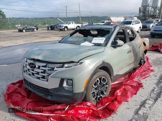 2023 Hyundai Santa Cruz SEL with VIN 5NTJCDAE1PH049512, listed as a IAAI auction lot 41359680 with Not provided miles and . Bid and sale history available at DreamBid. Image 2.