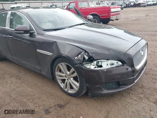 2011 Jaguar XJ with VIN SAJWA2GB9BLV12305, listed as a IAAI auction lot 41960231 with 105,742 mi miles. Bid and sale history available at carsss.com. Image 6.